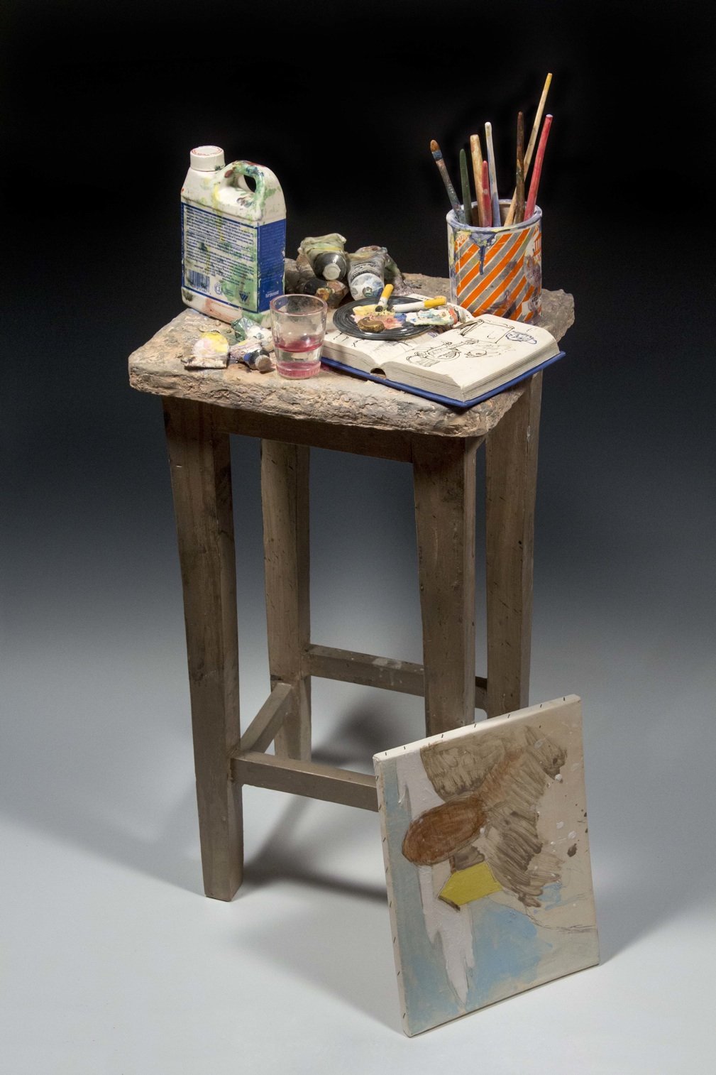 Richard Shaw  Painter's Table with Unfinished Painting, 37" x 20" x 15", glaze porcelain with overglaze decals